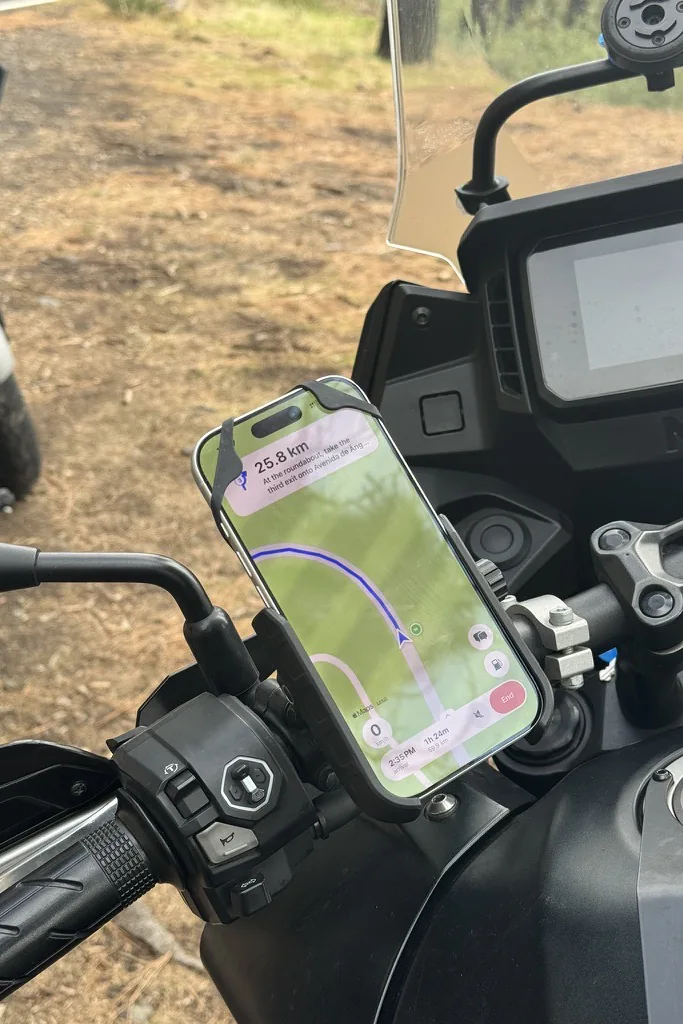 ScoutRoute navigating on an iPhone mounted to a motorcycle handlebar, on a ride in Tenerife